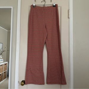 Urban Outfitters orange and white striped flared leggings 🧡🤍